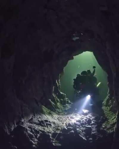 Imagine exploring a forbidden cave at the bottom of the sea.