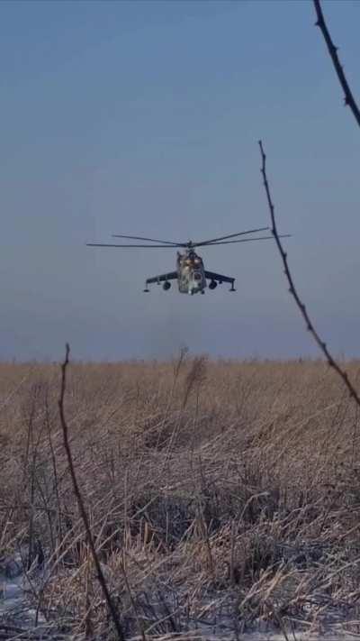 Ukrainian Mi-24 Gunship launching an indirect rocket salvo on the Donbas front