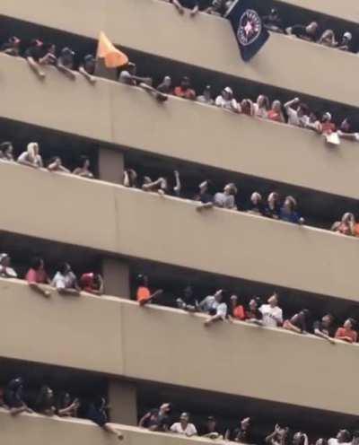 Woman drops her hat at an Astros game, the crowd comes together to help get it back to her