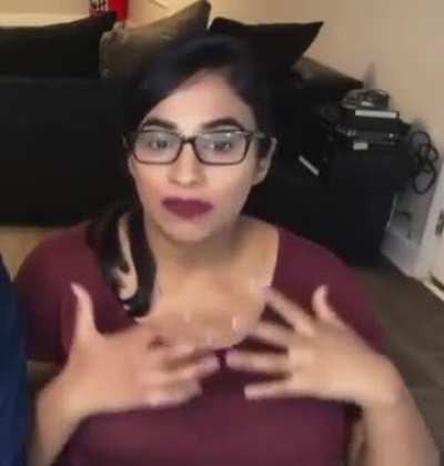 Deep prego tits. You can clearly see her white bra holding her massive tits 
