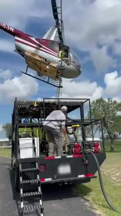 Pilot lands Helicopter Perfectly on Truck