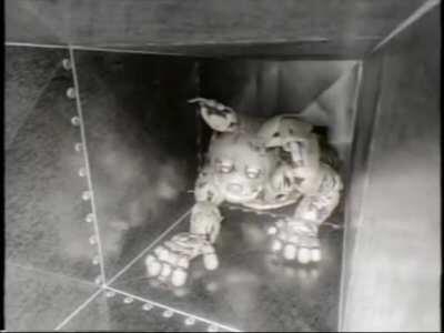 Springtrap strolling by the low framerate vent camera