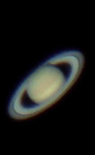 Planet Saturn through my telescope in my backyard