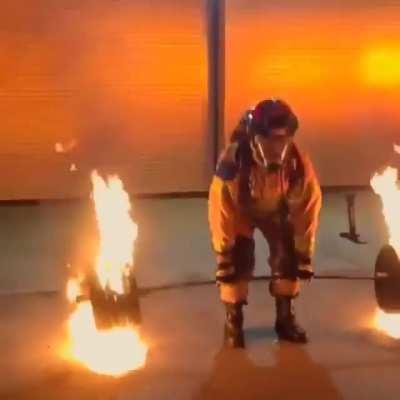 50 year old firefighter deadlifts 600 pounds of flaming steel to celebrate his retirement