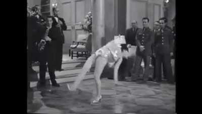 Miriam LaVelle flipping in heels, 1944