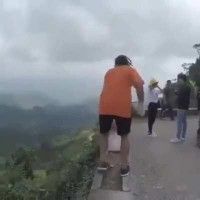 WCGW Doing backflips on a narrow wall in the mountains