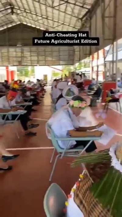 Students at a college in Philippines made hats for their exam to prevent peaking at others' papers.