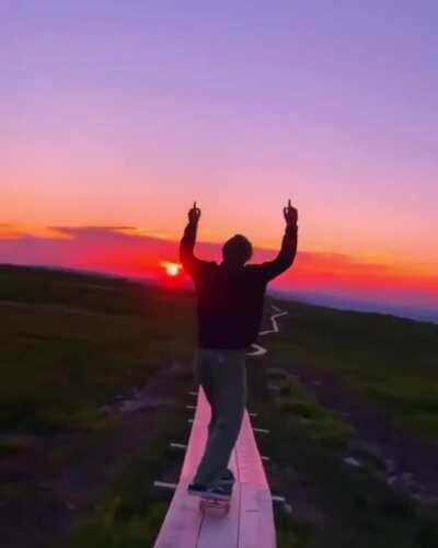 Skateboarding into the sunset.