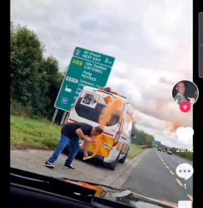 Obscuring motorists view on a motorway so you can get a video