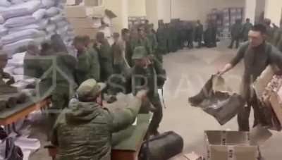 North Korean troops receiving Russian uniforms and equipment before heading to the front lines in Ukraine