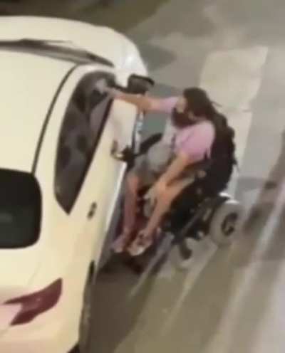 Handicapped man in wheelchair goes mad and destroys car blocking the way (illegal parking in Turkey)