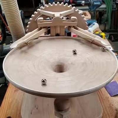 Insanely precise home- end selfmade wooden funnel for marbles, making sure not a single marble hits another [not OC]