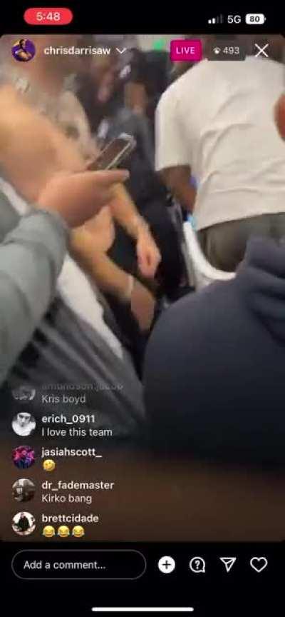 Kirk no shirt wearing multiple chains on plane ride home from Washington (via Christian Darrisaw IG live)