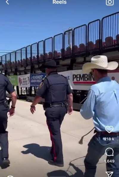 Cowboy captures cop in one go.