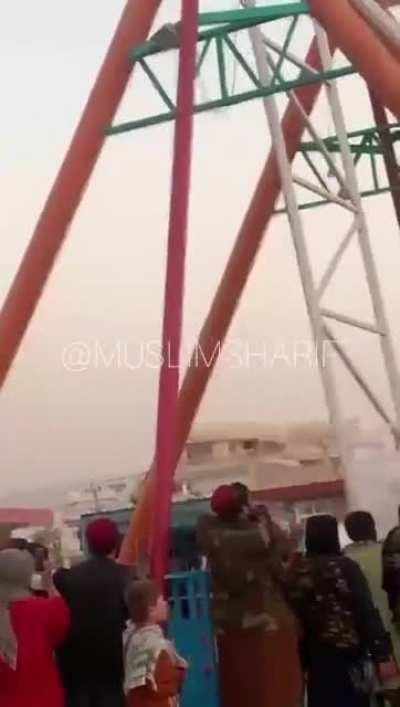 Taliban having some fun at amusement park in Mazer e Sharif