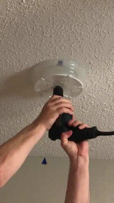 Hole saw + drill dust pan collects ceiling dust for easy cleanup