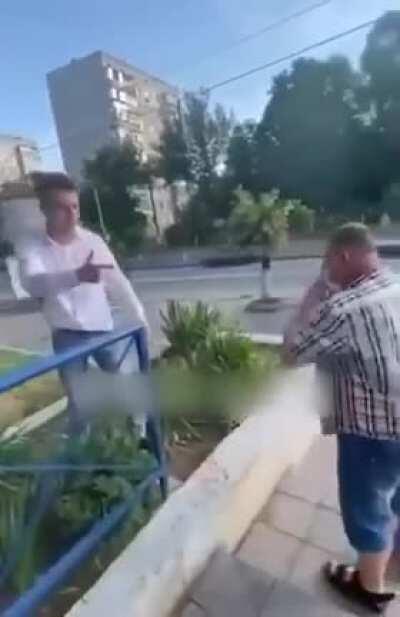 A guy attempted to kick another guy in the back only to fail and get a beating with a sausage. Russia