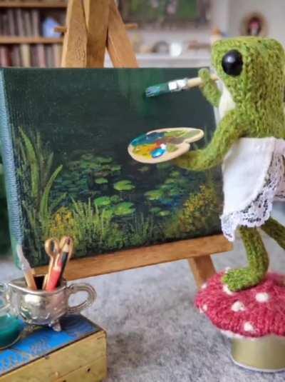 Watch this knitted frog paint a picture of his perfect place