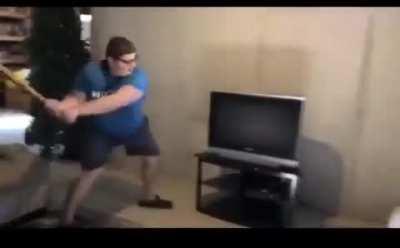 Wcgw with trying to break a TV with a bat