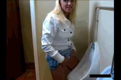 Classic clip: Clare Olsen standing peeing in the boys' room 