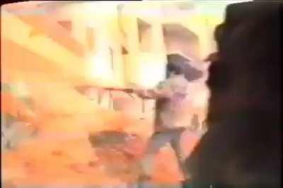 Hezbollah fighters battling Syrian troops in Beirut southern Suburbs, 1984.