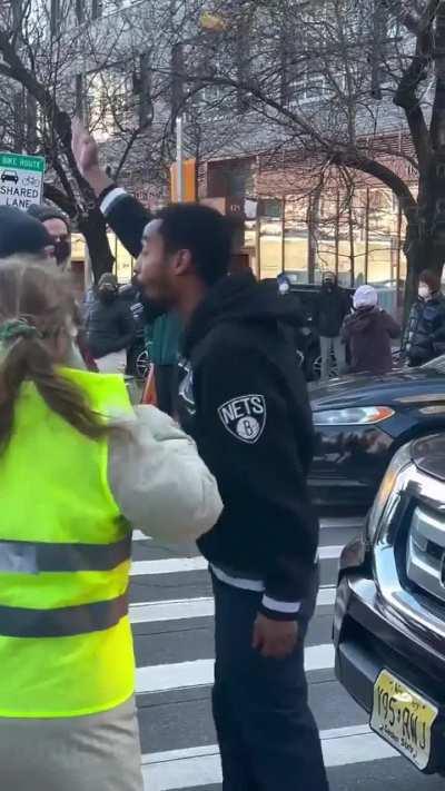 Protesters block man from picking up his daughter from school