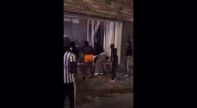 Mello Bucks beats Amari Blaze through a glass store window