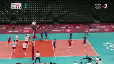 French Voleyball trainer tries to receive a ball out