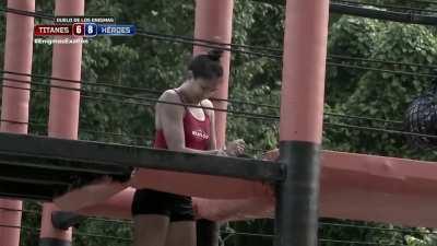 During an event, a competitor sets her dislocated shoulder back in place