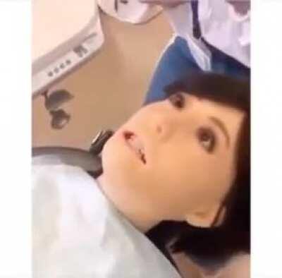 Dentist robot malfunctions and becomes aware