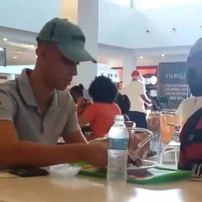 Restaurant worker noticed a disabled man was struggling to eat so he sat down and helped him ❤