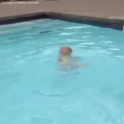 This 16 month old swims better than I can