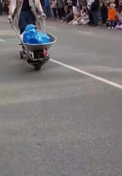 I saw this video of people lining up to presumably race on various vehicles made of household appliances, and I've been trying to find out what the full context behind it is.