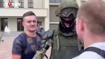 Belarusian soldier puts down his shield as a sign of solidarity and gets hugged by protesters