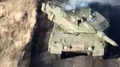 A Russian FPV drone hits a Swedish Stridsvagn tank of 122 Ukrainian soldiers in the Kharkiv region