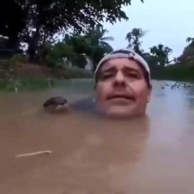 Guy chilling with an otter (Wholesome Moment)