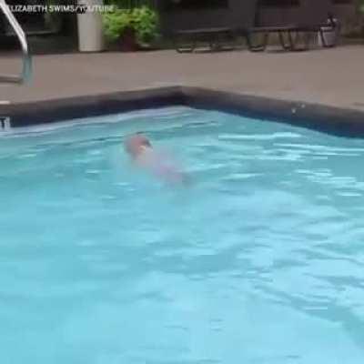 This 16 month old swimming better than I can