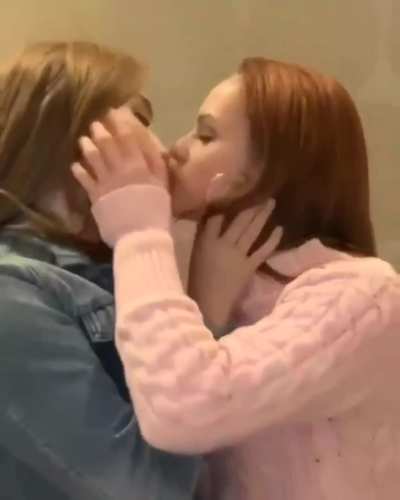 Two Redheads Playing