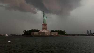 Lightning hits the Statue of liberty.