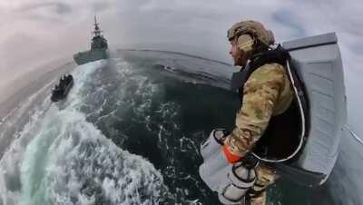 Royal Marines trialling ship boarding techniques with a Gravity jetpack