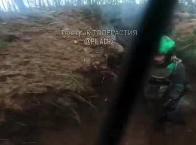 Ukranian soldier of the 3rd Seperate Assault Brigade wounded by a enemy soldier during a assault on their position (date and location unknown)