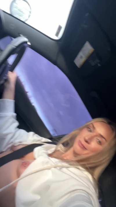 Flashing tits in the cop car 