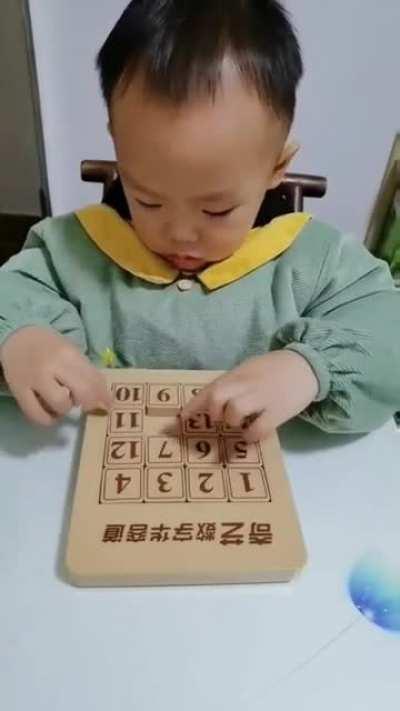 Little man doing this puzzle