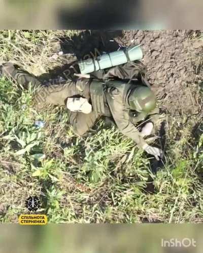 ru soldier tries to play dead but drone operator drops a grenade 