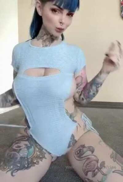 Riae showing off her big tits, tatts and a sexy tongue