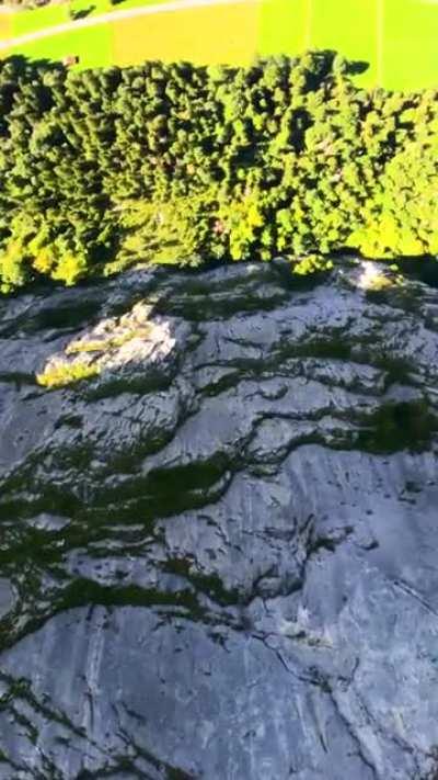 Base jumping off a big cliff