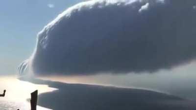 A beautiful roll cloud over Lake Michigan immortalized by Ken Temple