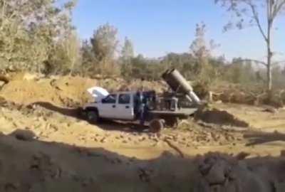 Chevy pickup with a mounted rocket used by hezbollah