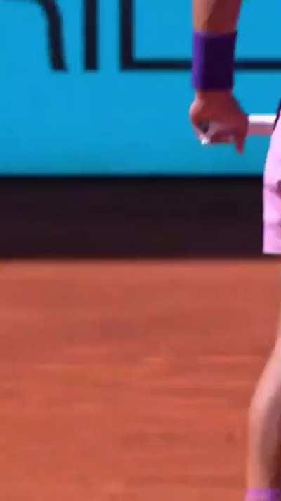 Rafael Nadal catches opponents shot with his racket