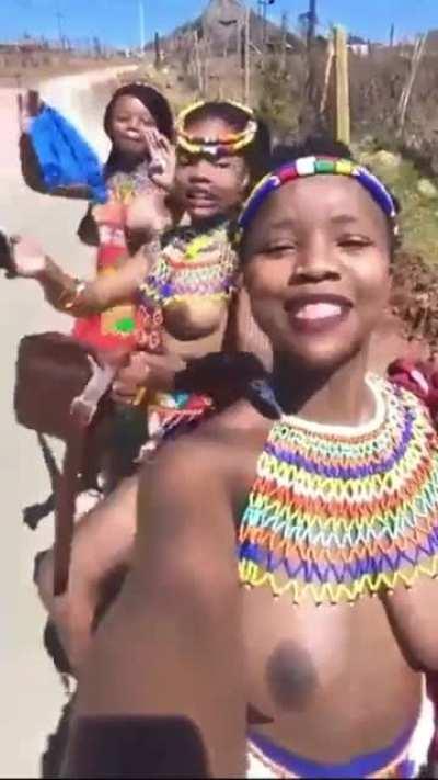 Zulu maidens laughing and being silly.